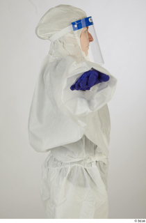 Daya Jones Nurse in Protective Suit A Pose upper body…